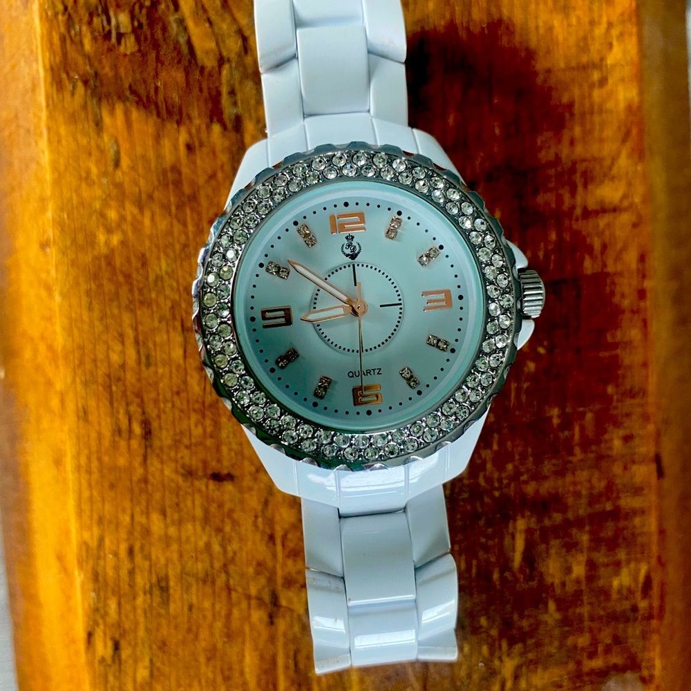 White, rose gold, and crystal watch from premier jewelry.